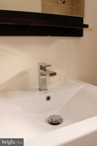 3900 West Cold Spring Lane Baltimore, MD 21215 - Photo 13 of 14 Half Bath 1