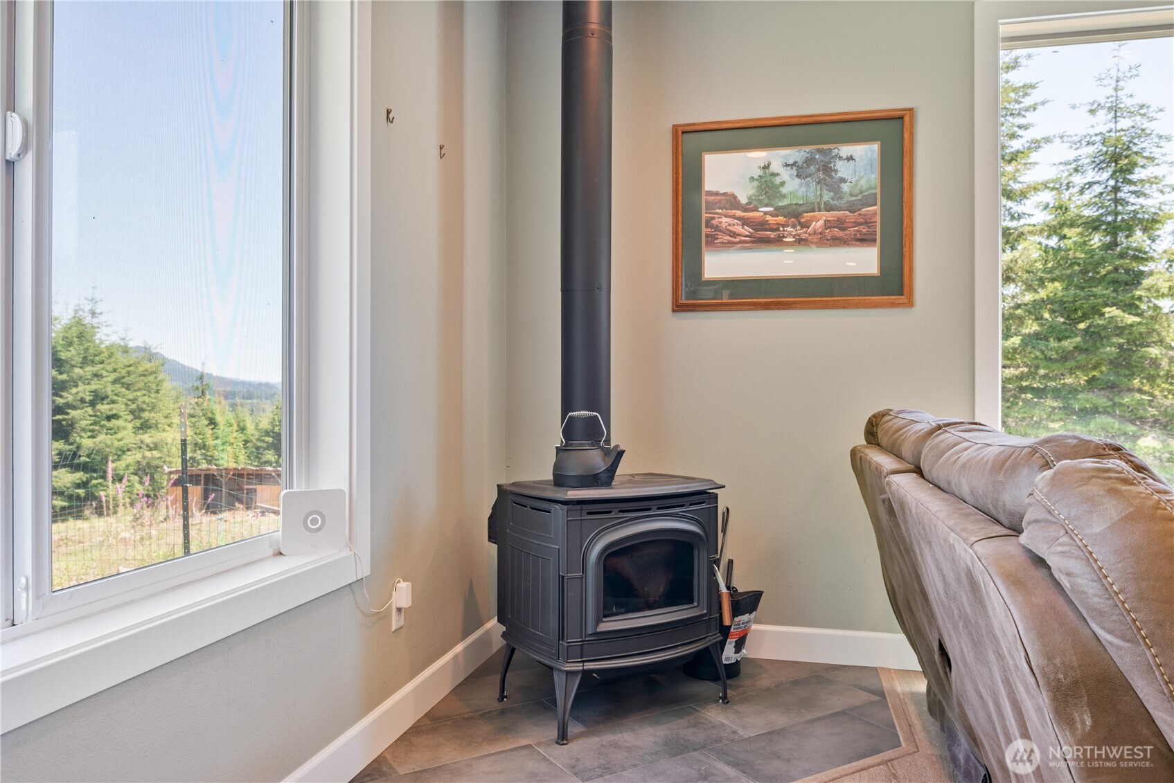 327 Parpala Road Naselle, WA 98638 - Photo 8 of 39 a living room with furniture and a window