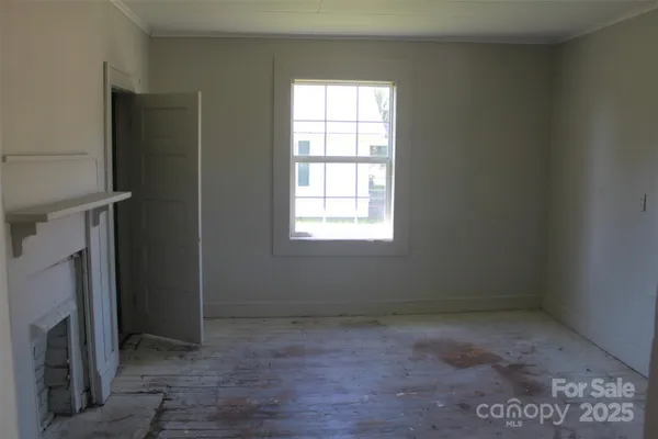 en empty room with windows