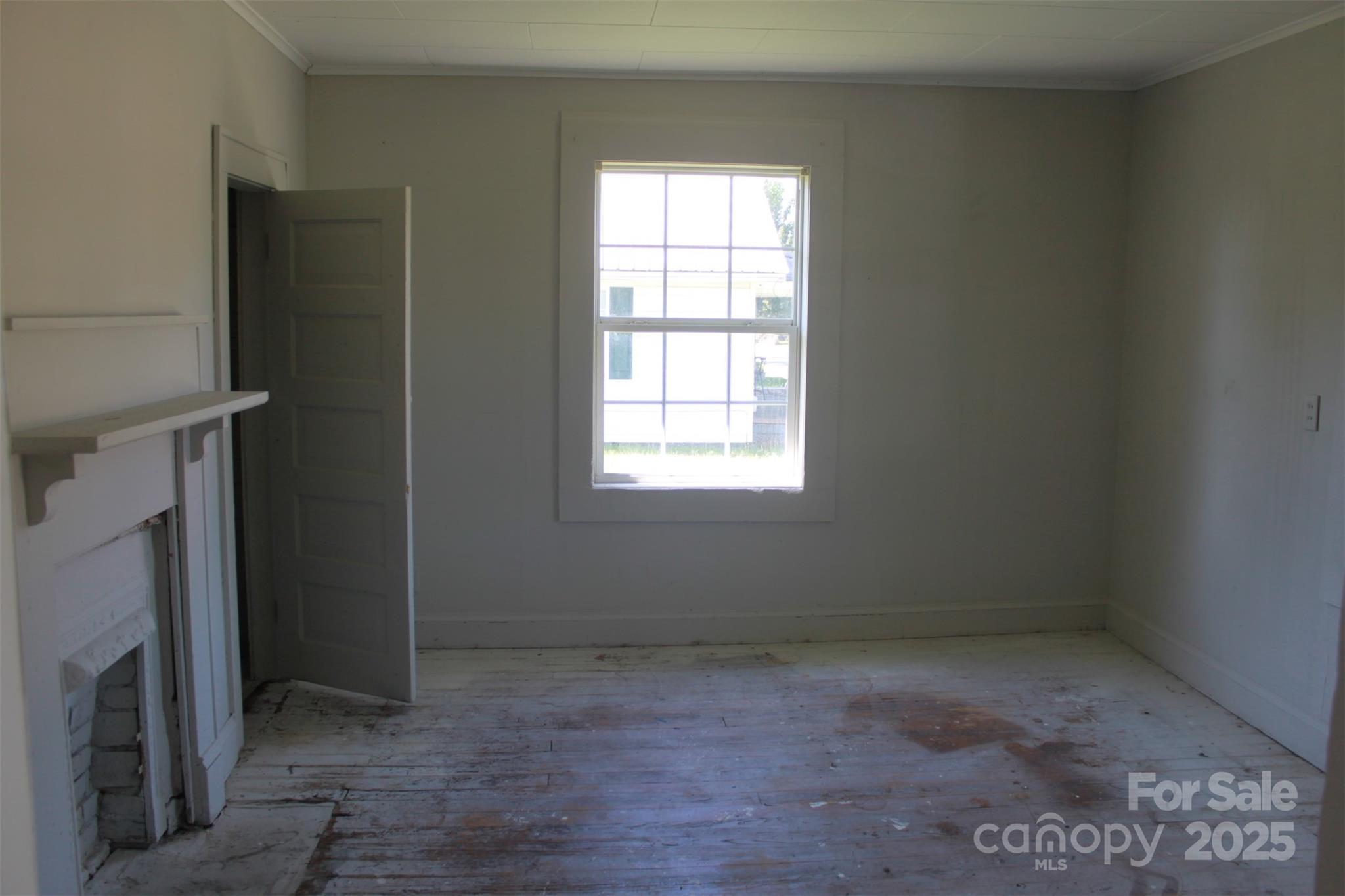 496 Spindale Street Spindale, NC 28160 - Photo 12 of 25 en empty room with windows