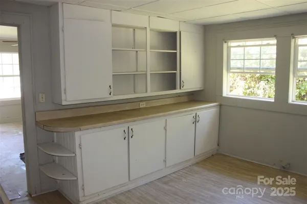 an empty room with windows