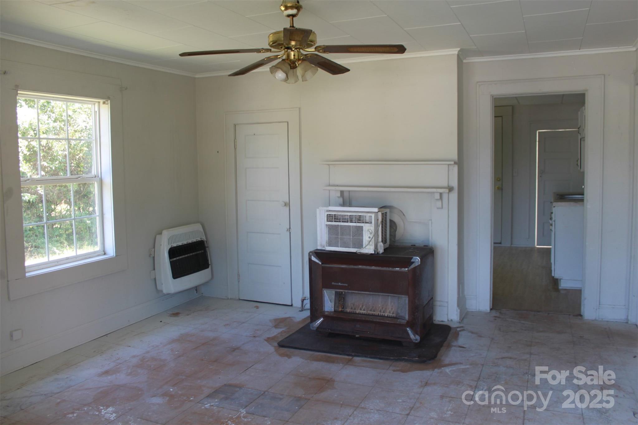 496 Spindale Street Spindale, NC 28160 - Photo 9 of 25 a living room with furniture and a fireplace