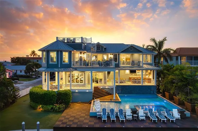 a front view of a residential apartment building with a yard