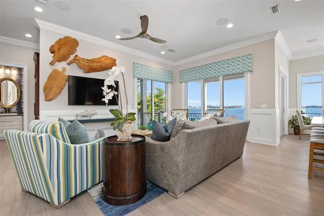 a bedroom with a bed furniture and a flat screen tv