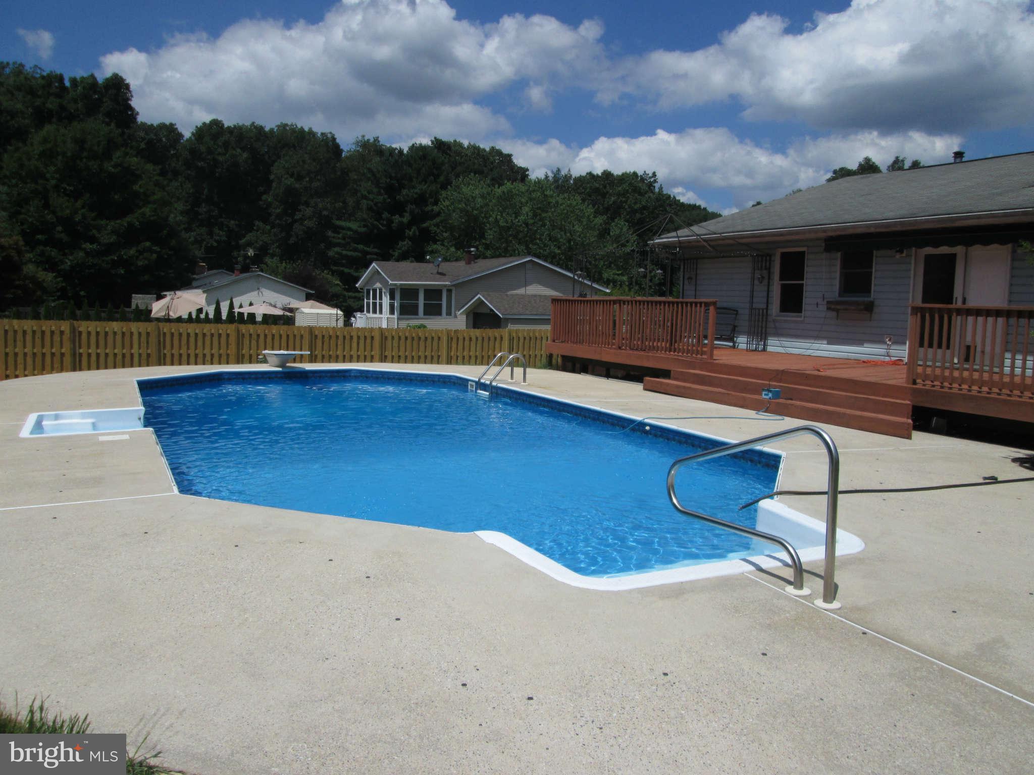 3697 Altondale Road Reisterstown, MD 21136 - Photo 2 of 21 a view of a house with pool and chairs