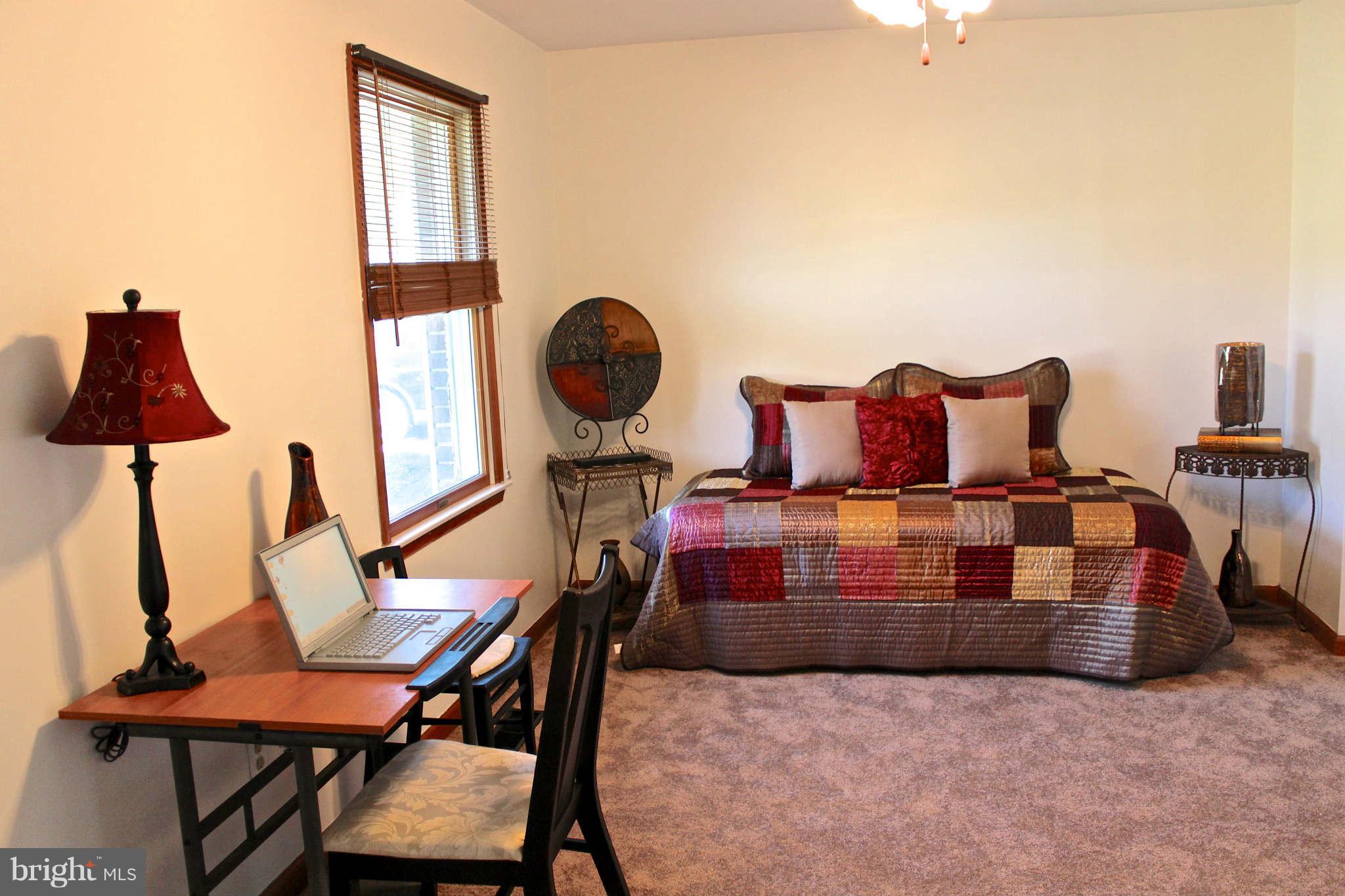 3697 Altondale Road Reisterstown, MD 21136 - Photo 12 of 21 a living room with furniture and a lamp