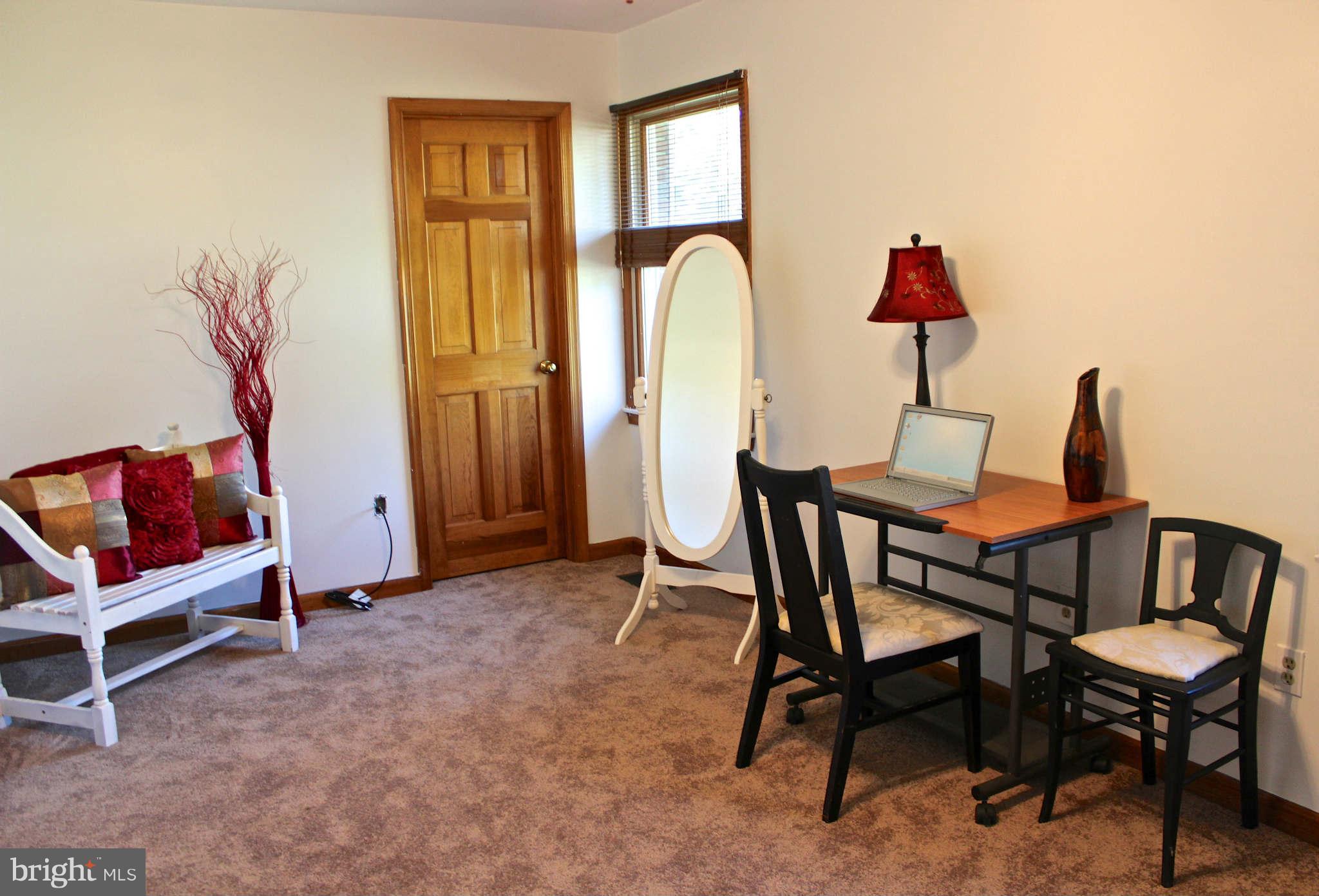 3697 Altondale Road Reisterstown, MD 21136 - Photo 13 of 21 a view of a room with furniture and wooden floor