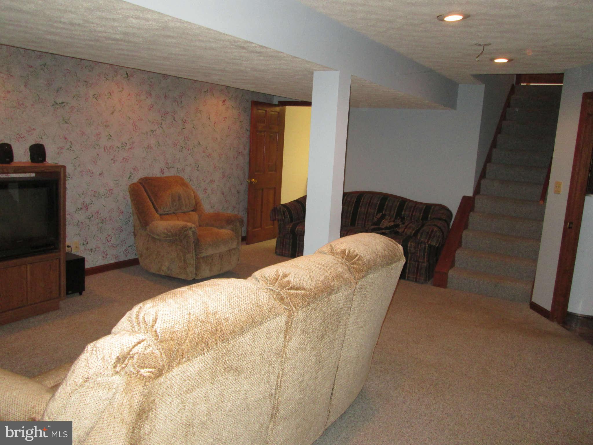 3697 Altondale Road Reisterstown, MD 21136 - Photo 18 of 21 a living room with furniture and a couch