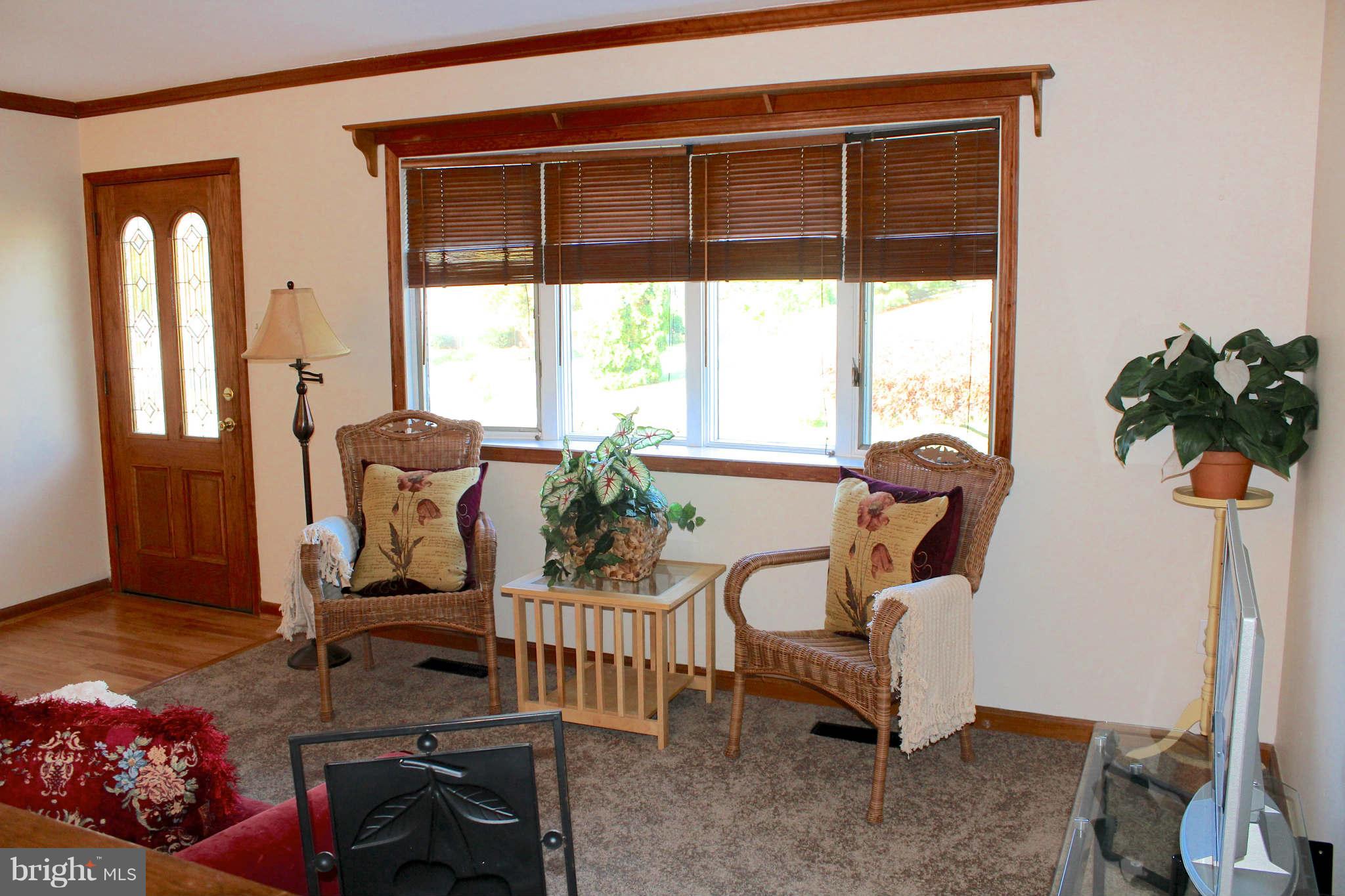 3697 Altondale Road Reisterstown, MD 21136 - Photo 3 of 21 a living room with furniture and a window