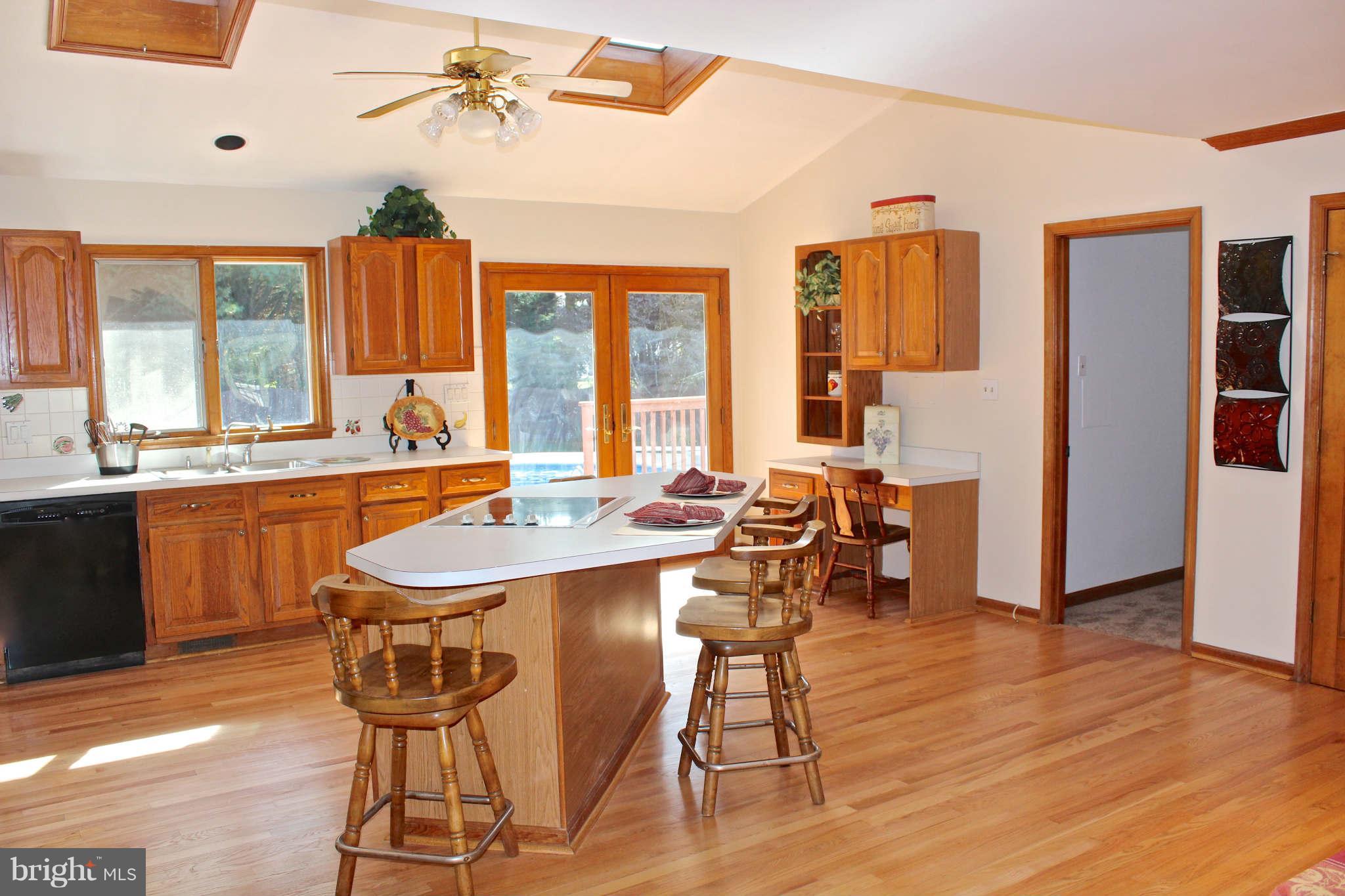3697 Altondale Road Reisterstown, MD 21136 - Photo 7 of 21 a view of a a dining room with furniture window and wooden floor