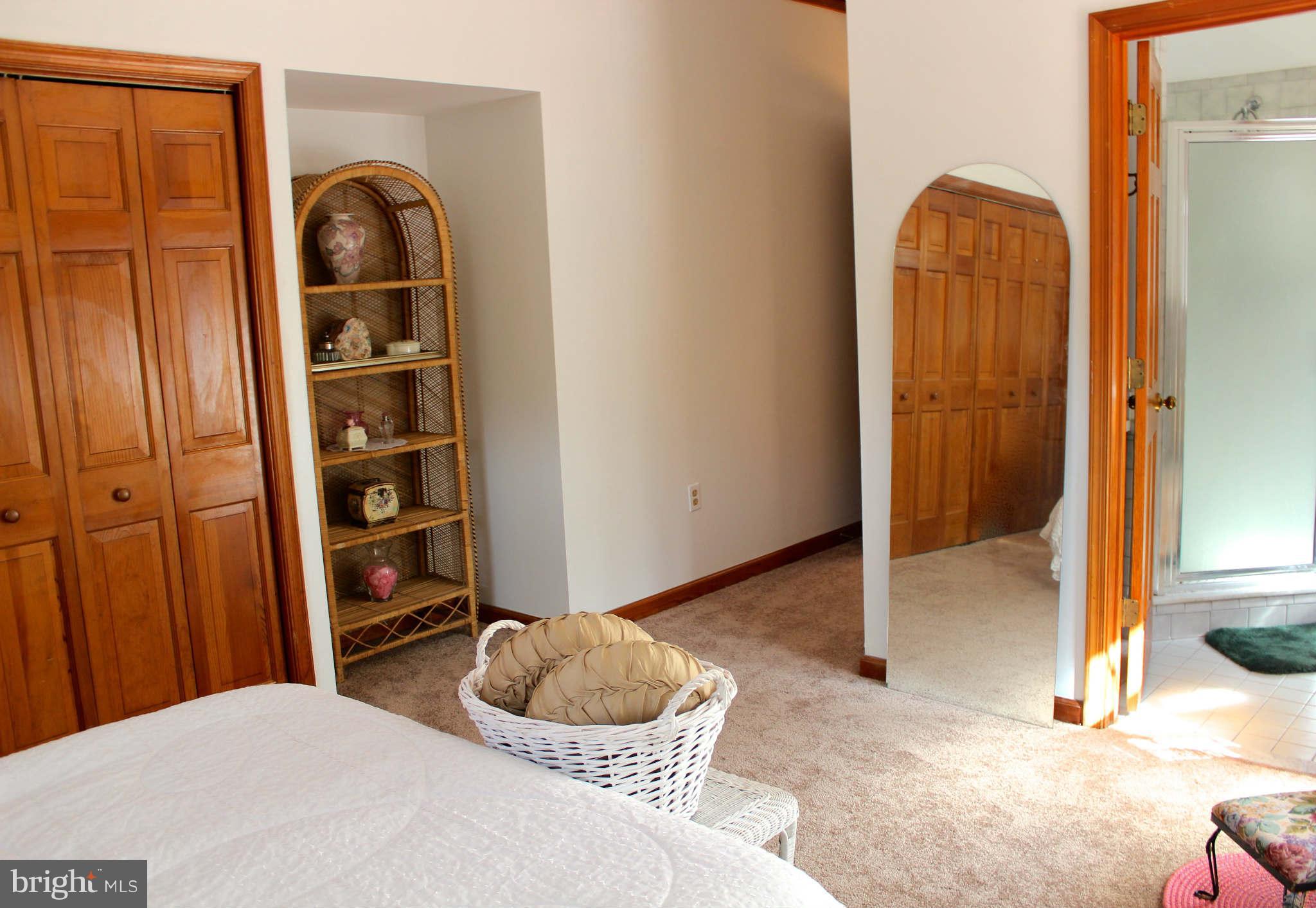 3697 Altondale Road Reisterstown, MD 21136 - Photo 10 of 21 a bedroom with a bed and a cabinets