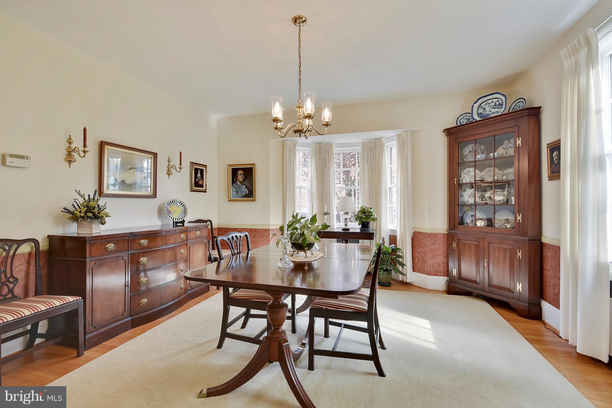 708 Stoneleigh Road Baltimore, MD 21212 - Photo 11 of 61 a view of a dining room with furniture and chandelier