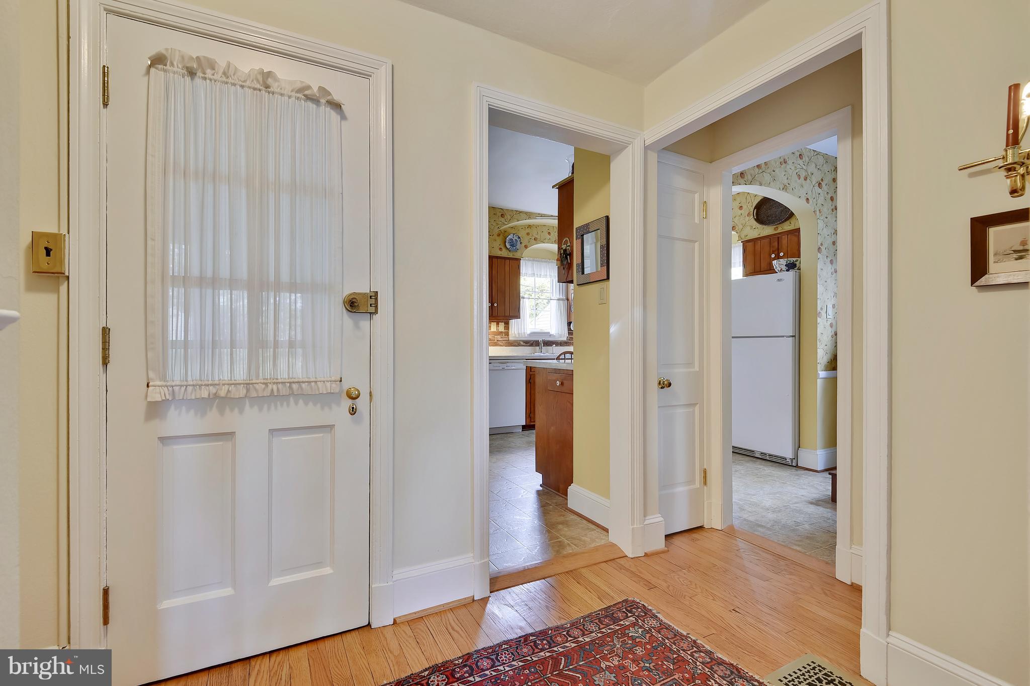 708 Stoneleigh Road Baltimore, MD 21212 - Photo 15 of 61 a view of a hallway with wooden floor and closet