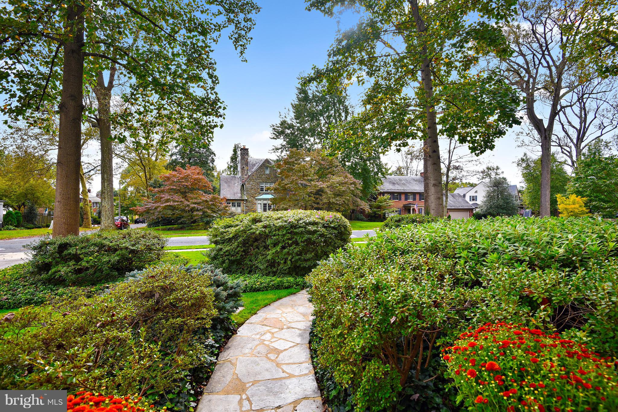 708 Stoneleigh Road Baltimore, MD 21212 - Photo 26 of 61 a view of a garden with large trees