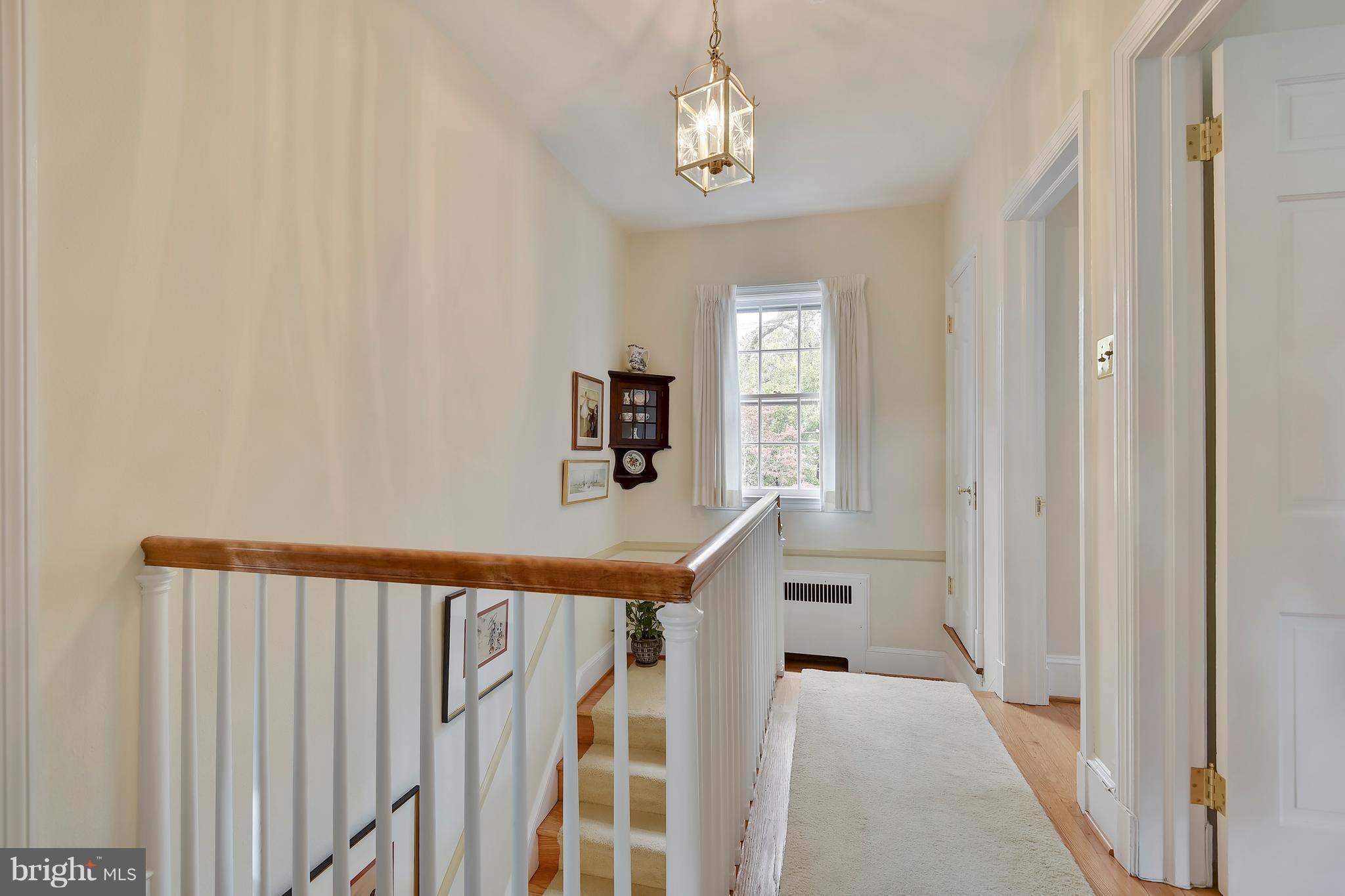 708 Stoneleigh Road Baltimore, MD 21212 - Photo 35 of 61 a view of a hallway with windows