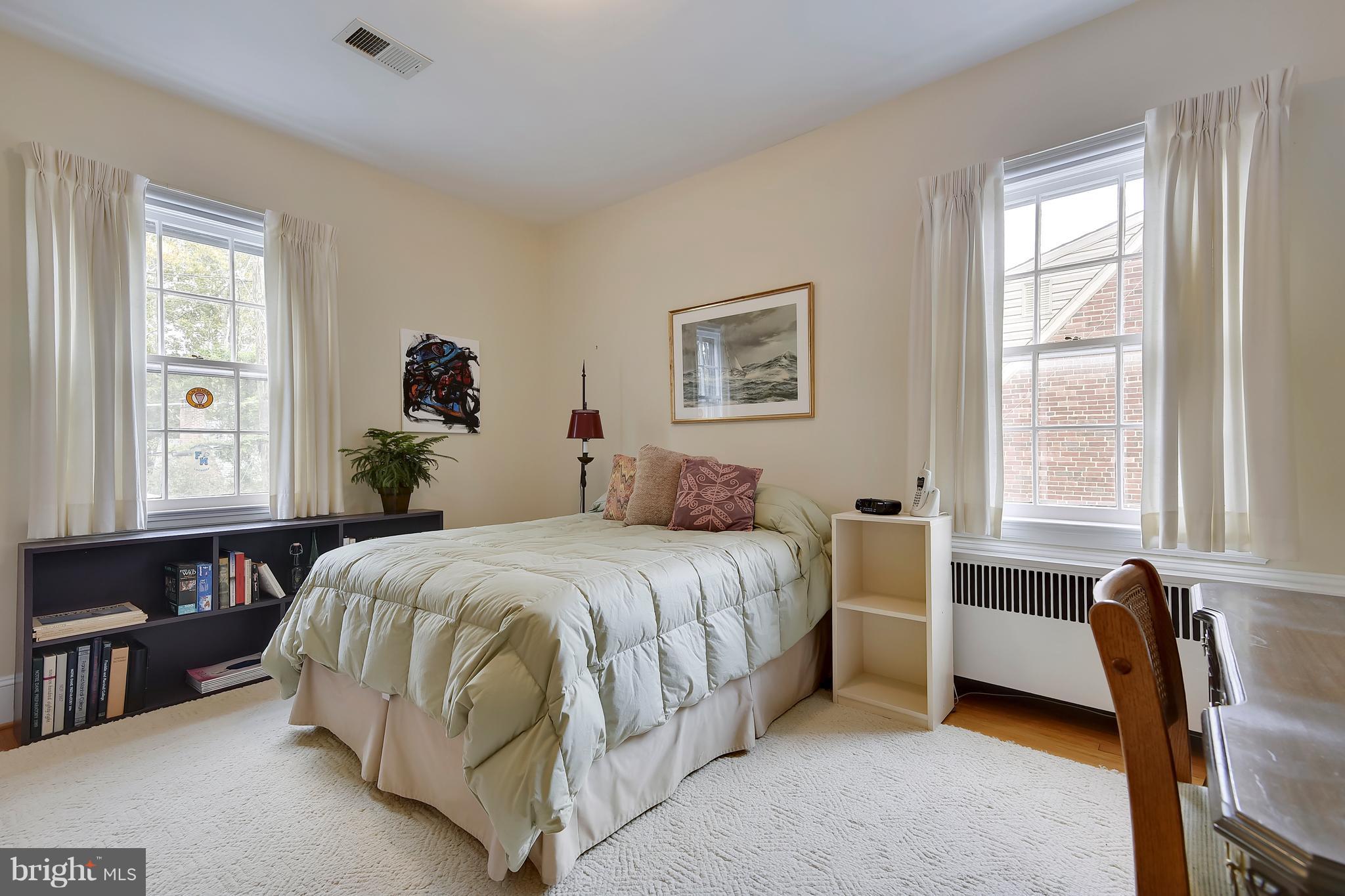 708 Stoneleigh Road Baltimore, MD 21212 - Photo 42 of 61 a bedroom with a bed and a window