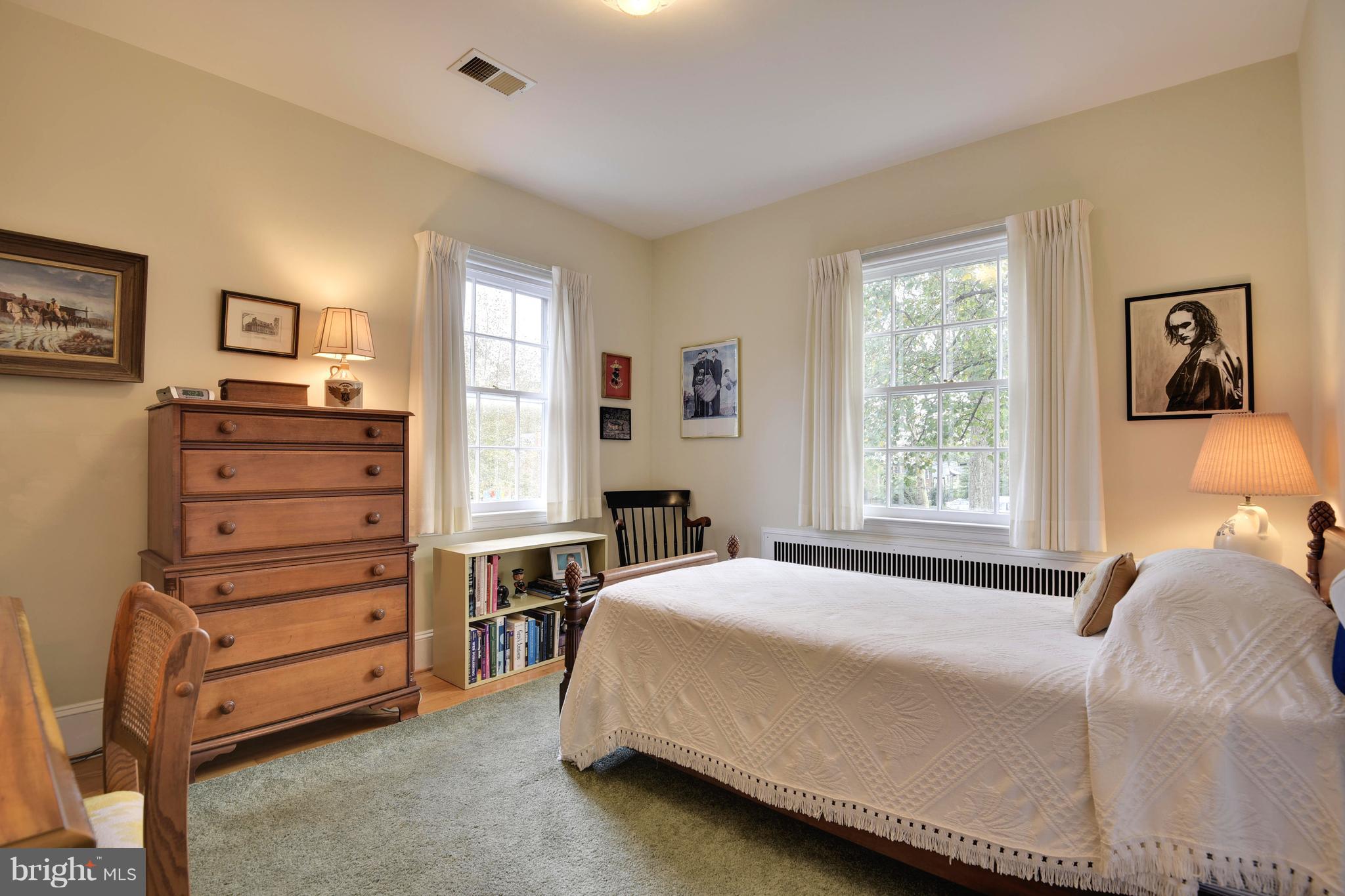 708 Stoneleigh Road Baltimore, MD 21212 - Photo 45 of 61 a bedroom with a bed and a tv