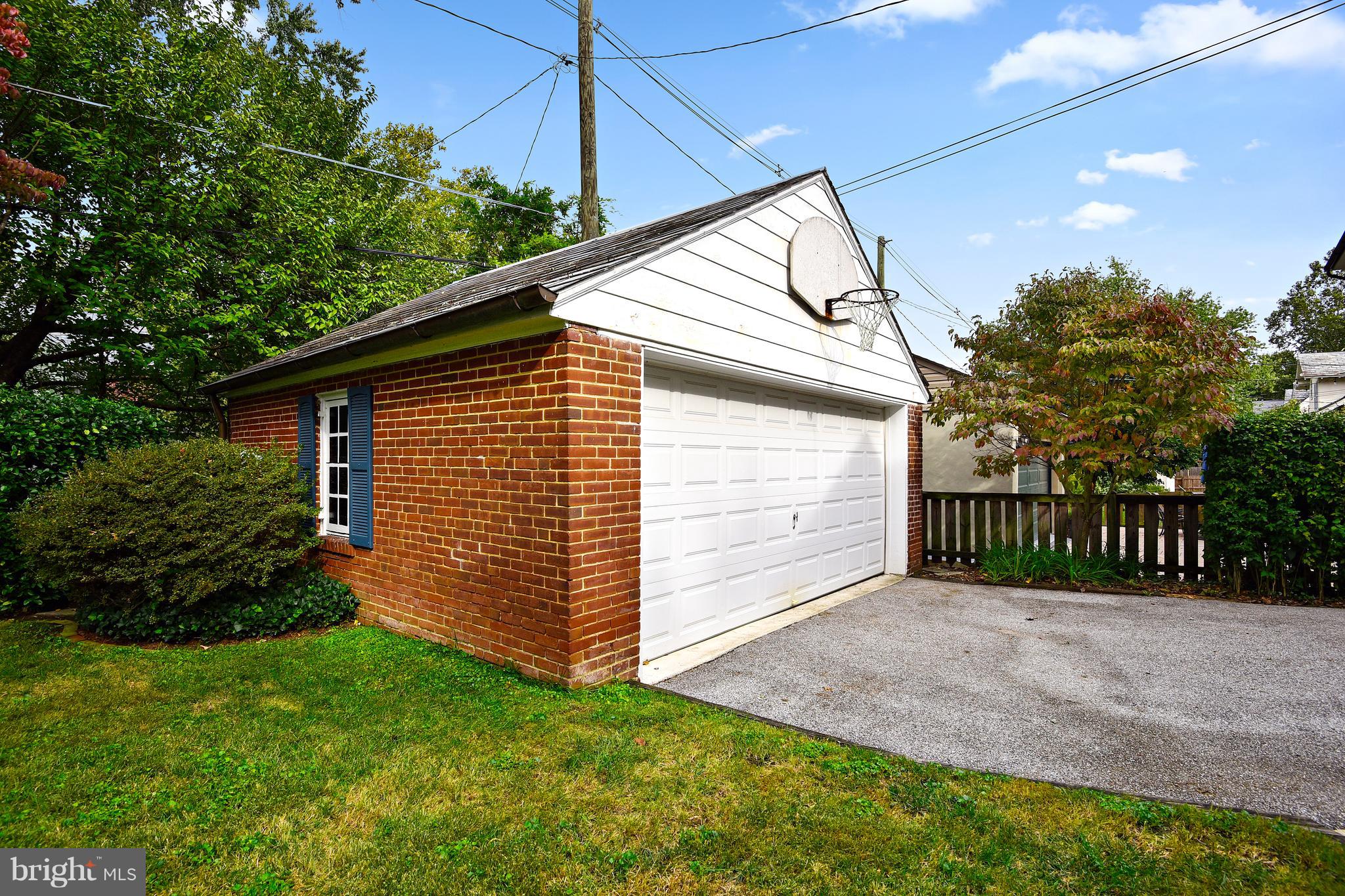 708 Stoneleigh Road Baltimore, MD 21212 - Photo 51 of 61 a view of a backyard with a small cabin