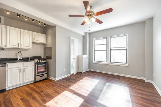 a balcony view with a seating space