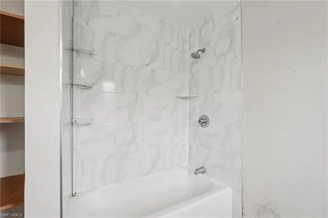 a bathroom with a bathtub