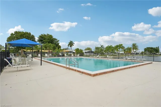 an outdoor space with furniture and garden