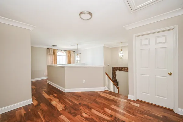 a view of a yard with a house in the background