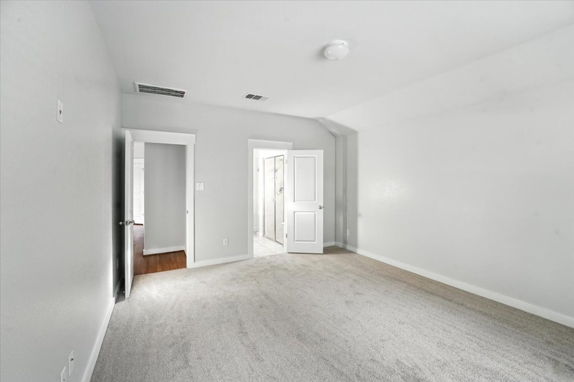 305 Old Trinity Way Georgetown, TX 78628 - Photo 13 of 23 a view of an empty room with closet and a window