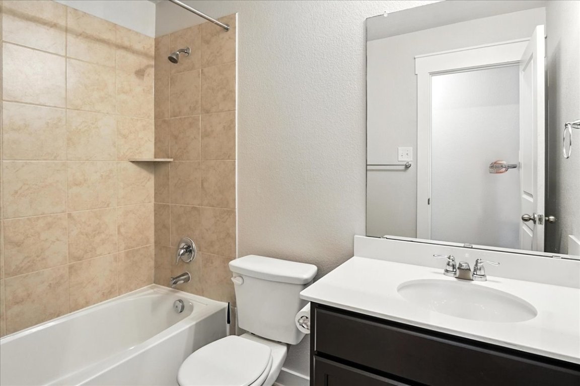 305 Old Trinity Way Georgetown, TX 78628 - Photo 18 of 23 a bathroom with a sink toilet tub and shower