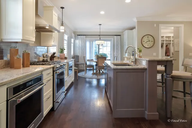 a kitchen with a stove oven and a refrigerator