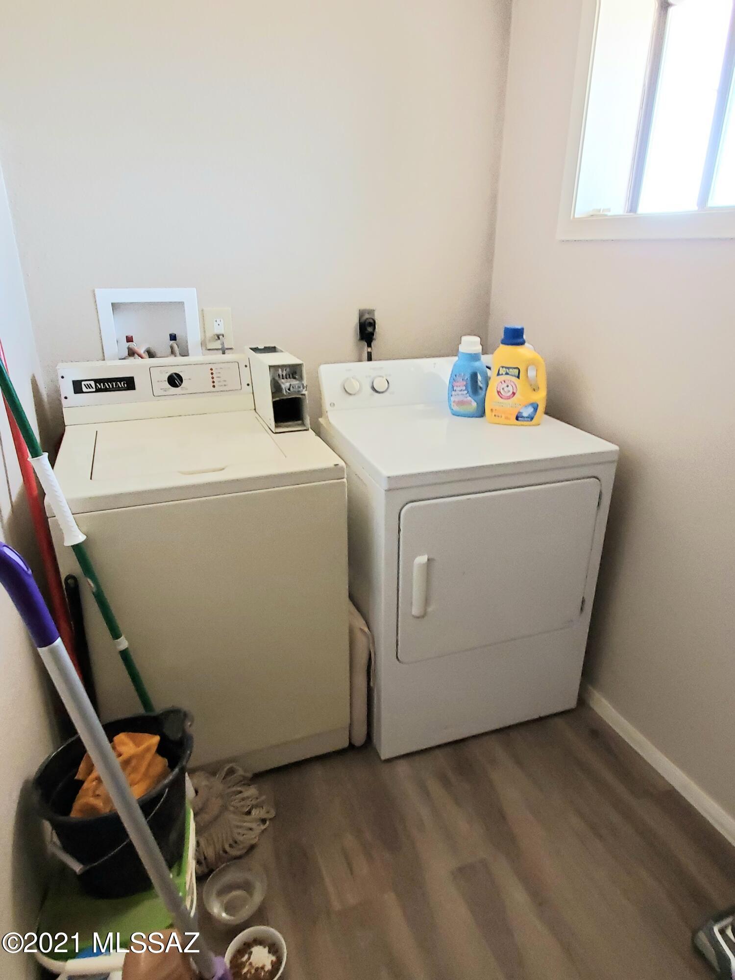 3440 East Howling Wolf Road Willcox, AZ 85643 - Photo 21 of 45 a utility room with dryer and washer