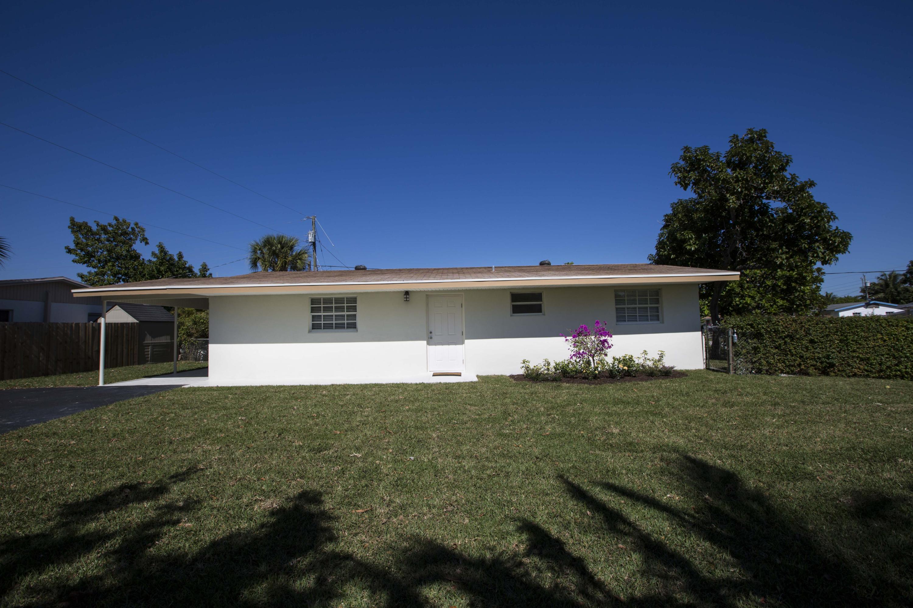 6065 Haddon Road West Palm Beach, FL 33417 - Photo 1 of 10 Front of House