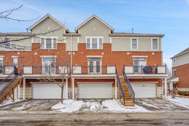a front view of a house with yard