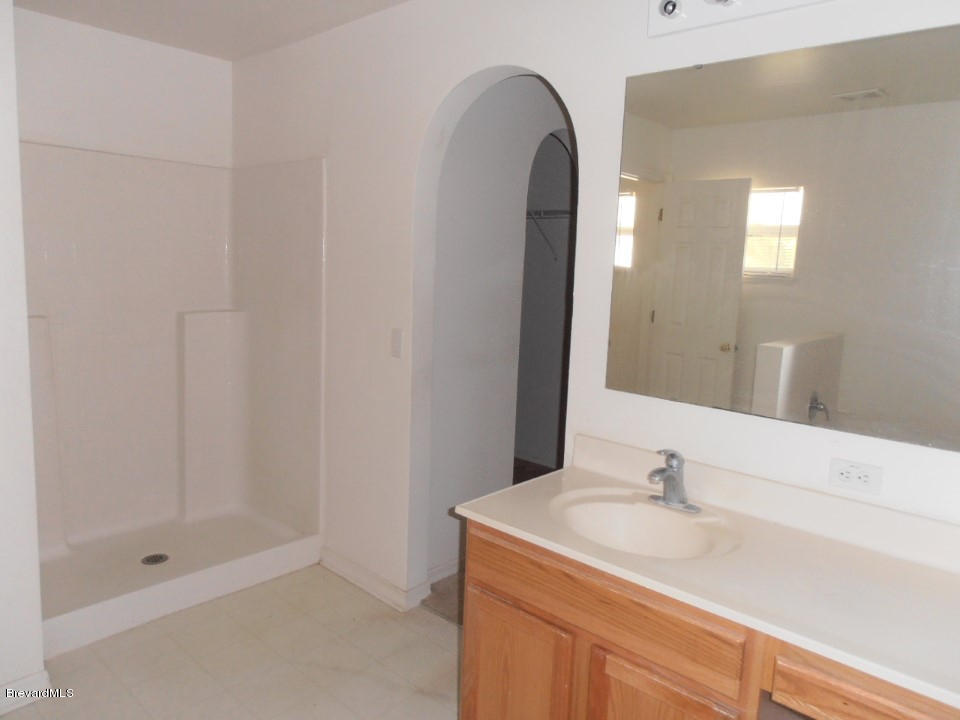 178 Finkle Street Palm Bay, FL 32908 - Photo 6 of 12 Master Bathroom with Walk-in Shower