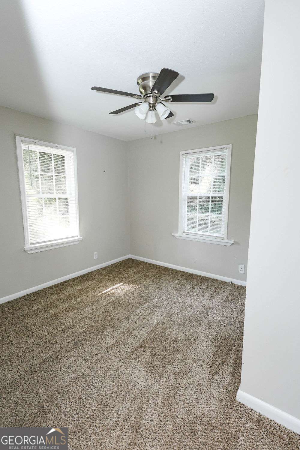 218 East Bonacre Road Cataula, GA 31804 - Photo 18 of 24 a view of an empty room with a window