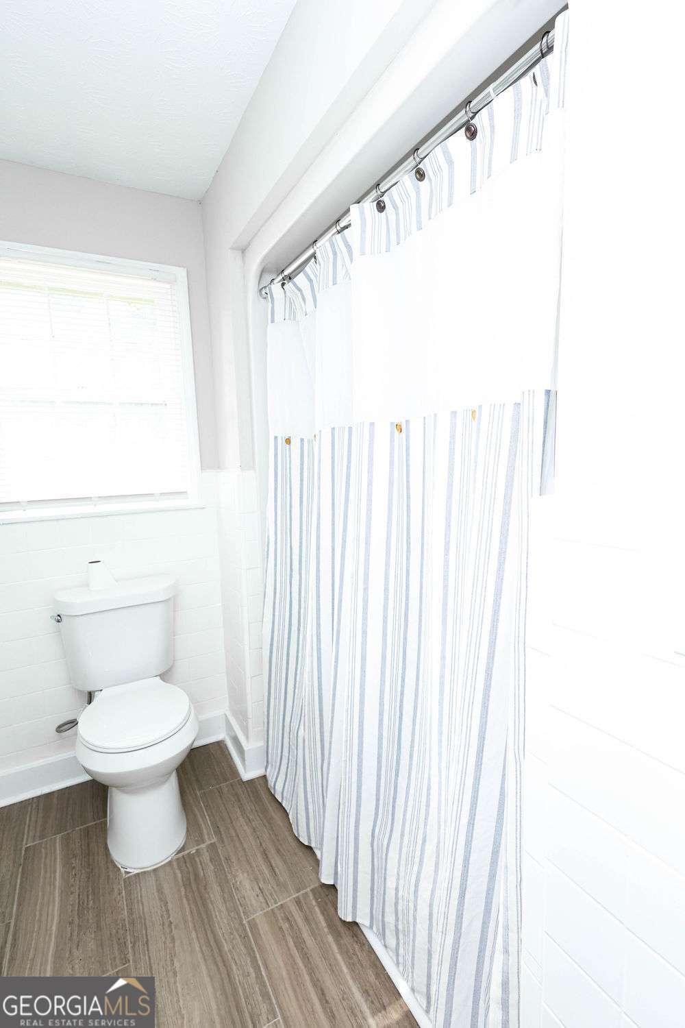 218 East Bonacre Road Cataula, GA 31804 - Photo 20 of 24 a bathroom with a toilet and a window