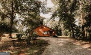 218 East Bonacre Road Cataula, GA 31804 - Photo 3 of 24 a front view of a house with a yard