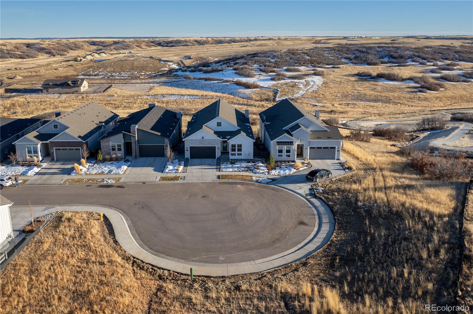 6976 Rim Ridge Drive Castle Pines, CO 80108 - Photo 41 of 50 an aerial view of residential houses with outdoor space