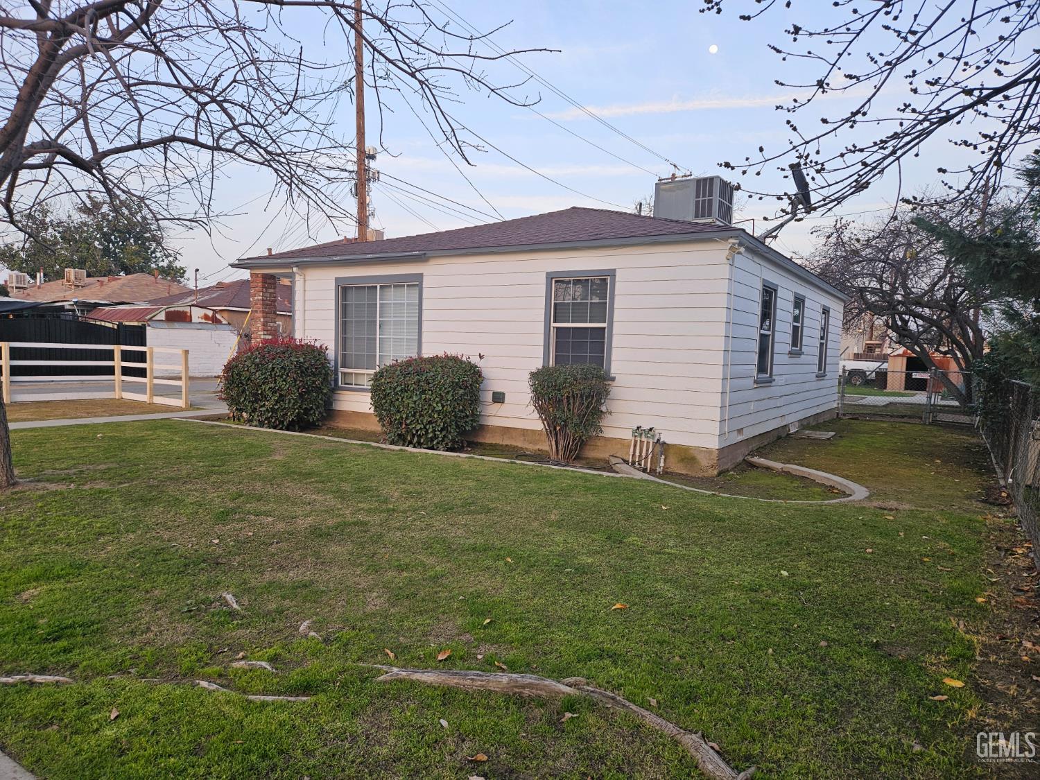 Undisclosed Address Wasco, CA 93280 - Photo 2 of 3 a view of a house with a yard