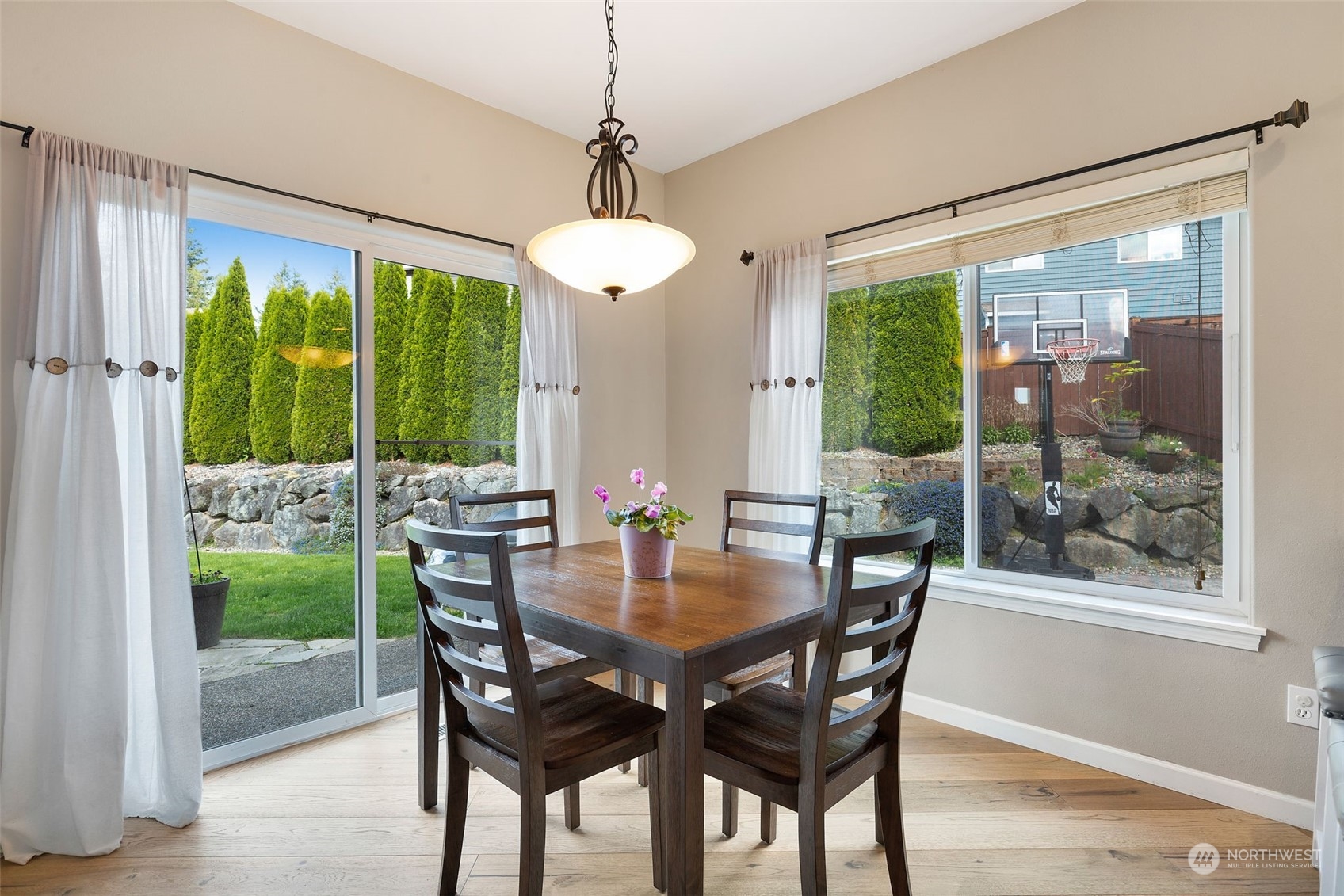 1227 187th Street Southeast Bothell, WA 98012 - Photo 11 of 38 a view of a dining room with furniture window and outside view