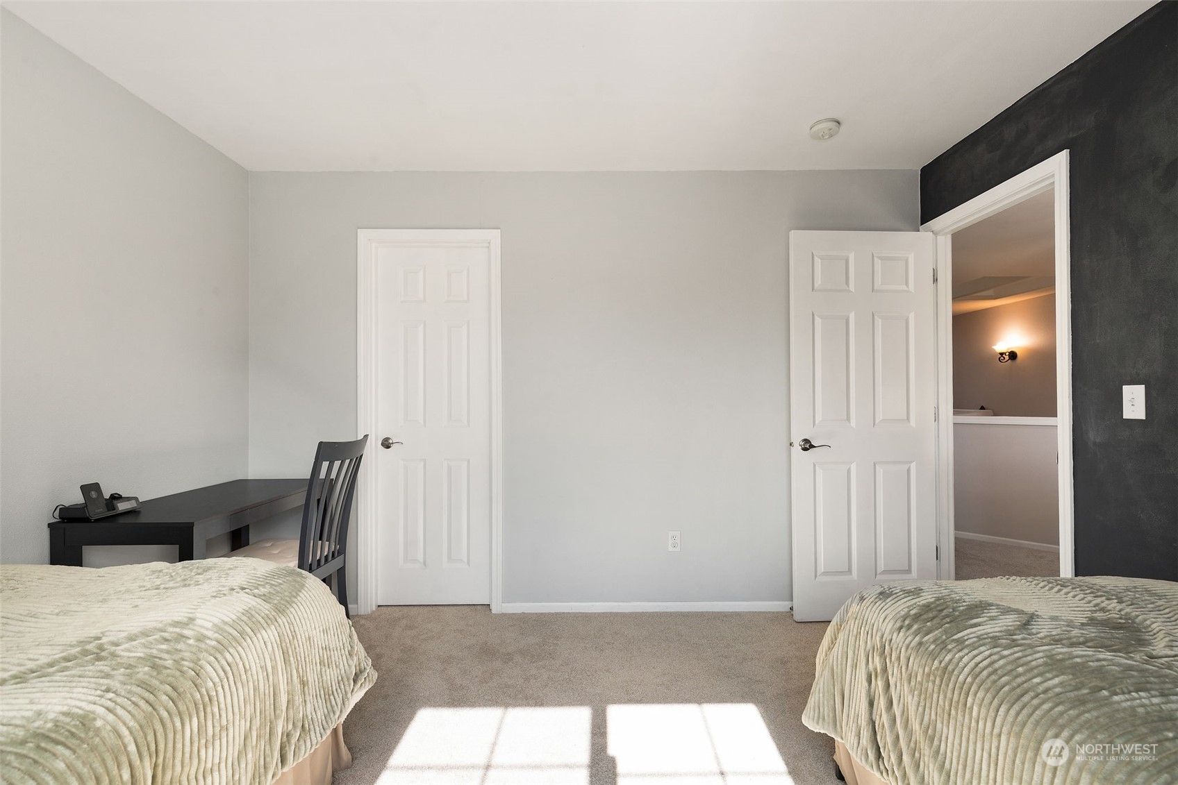 1227 187th Street Southeast Bothell, WA 98012 - Photo 31 of 38 a bedroom with a bed and a mirror