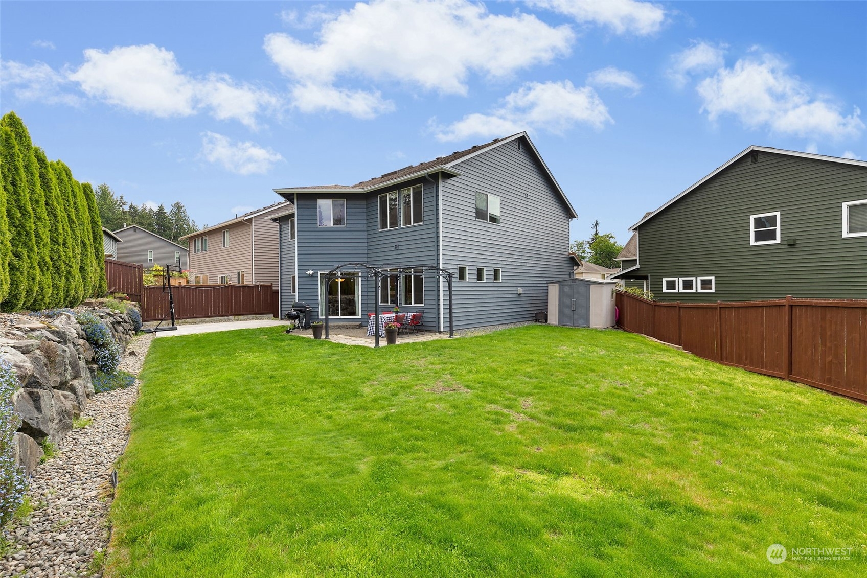 1227 187th Street Southeast Bothell, WA 98012 - Photo 32 of 38 a view of a house with a yard and front view of a house