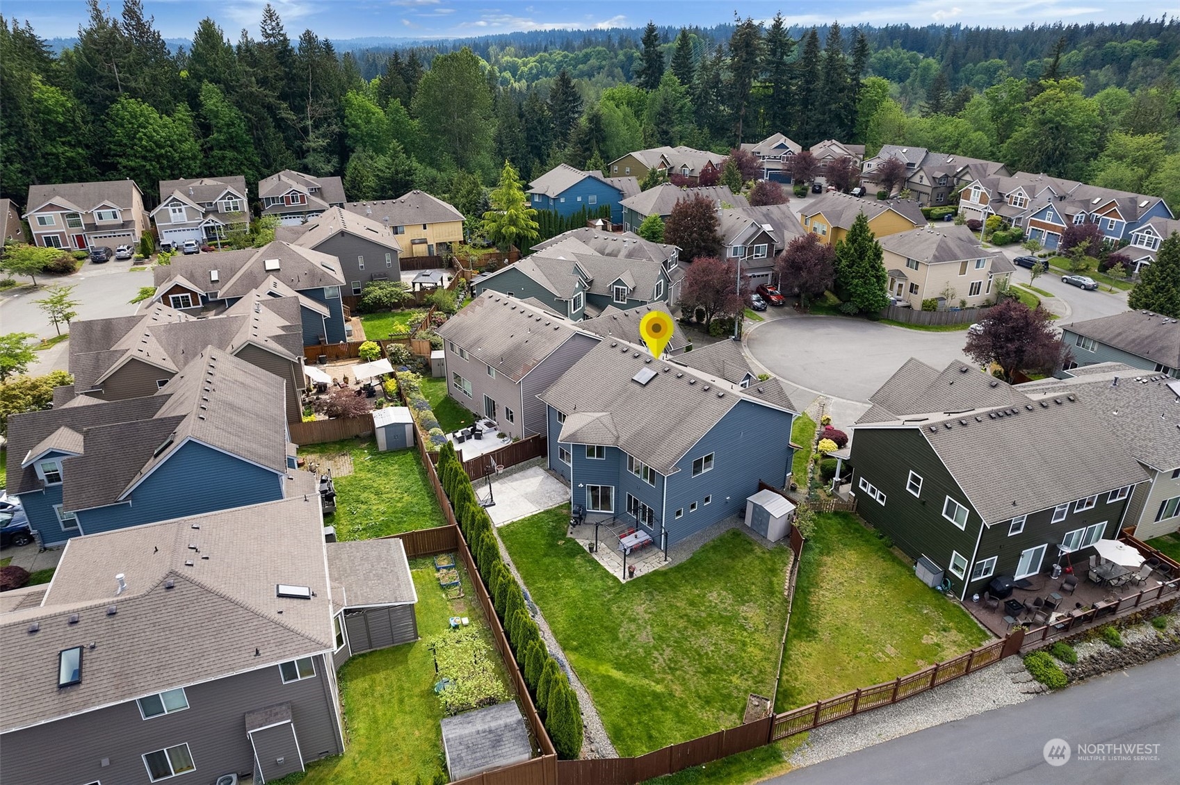 1227 187th Street Southeast Bothell, WA 98012 - Photo 33 of 38 an aerial view of a house with a garden