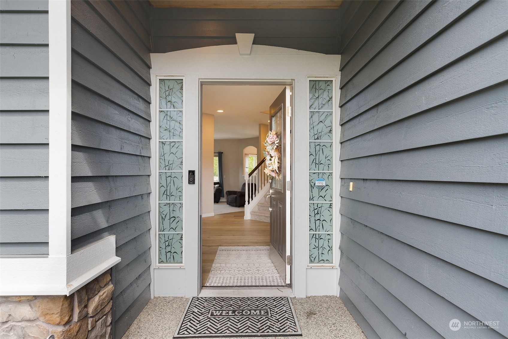 1227 187th Street Southeast Bothell, WA 98012 - Photo 4 of 38 a view of a entryway door of the house