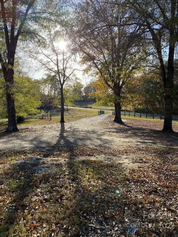 671 Jess Lamb Road Rutherfordton, NC 28139 - Photo 30 of 31 a view of outdoor space with deck and trees