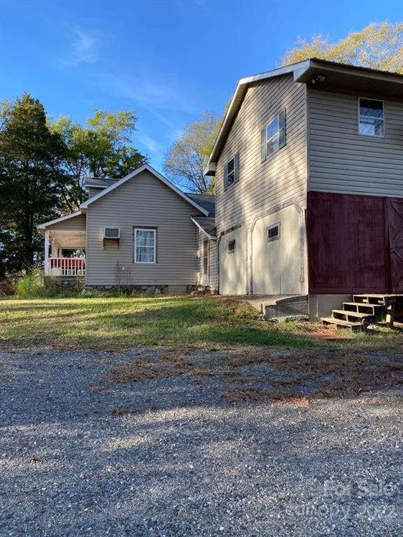 671 Jess Lamb Road Rutherfordton, NC 28139 - Photo 8 of 31 a view of a house with a yard