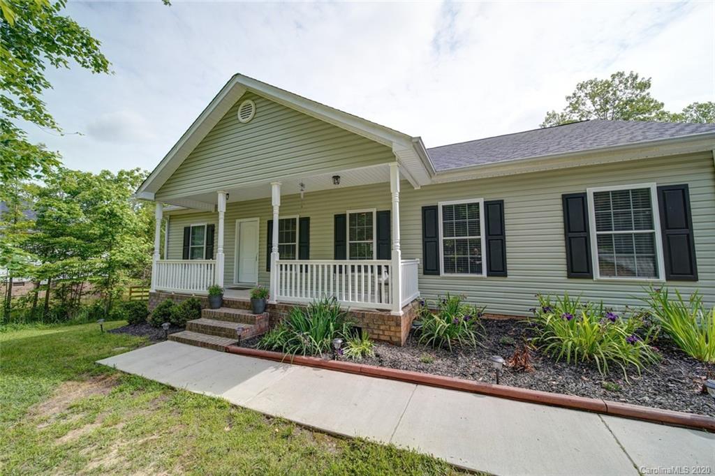 3018 Ranger Road Clover, SC 29710 - Photo 1 of 31 a front view of a house with garden