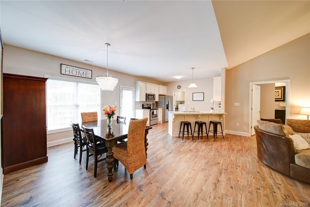 3018 Ranger Road Clover, SC 29710 - Photo 16 of 31 a view of a dining room with furniture and wooden floor
