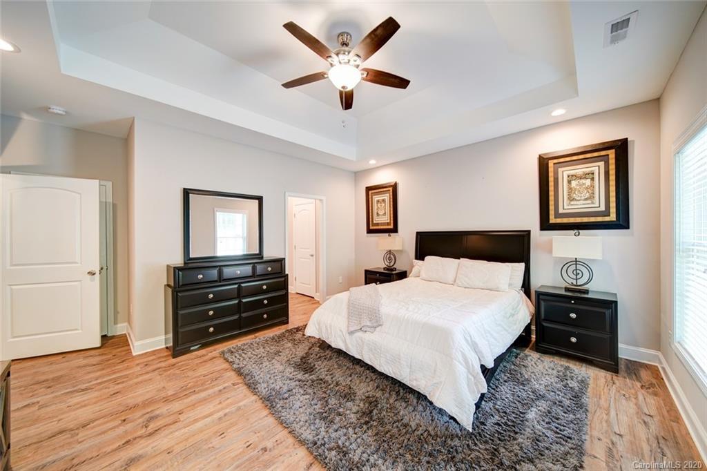 3018 Ranger Road Clover, SC 29710 - Photo 18 of 31 a bedroom with a bed and wooden floor