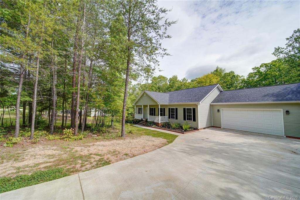 3018 Ranger Road Clover, SC 29710 - Photo 3 of 31 a view of house with a big yard and large trees