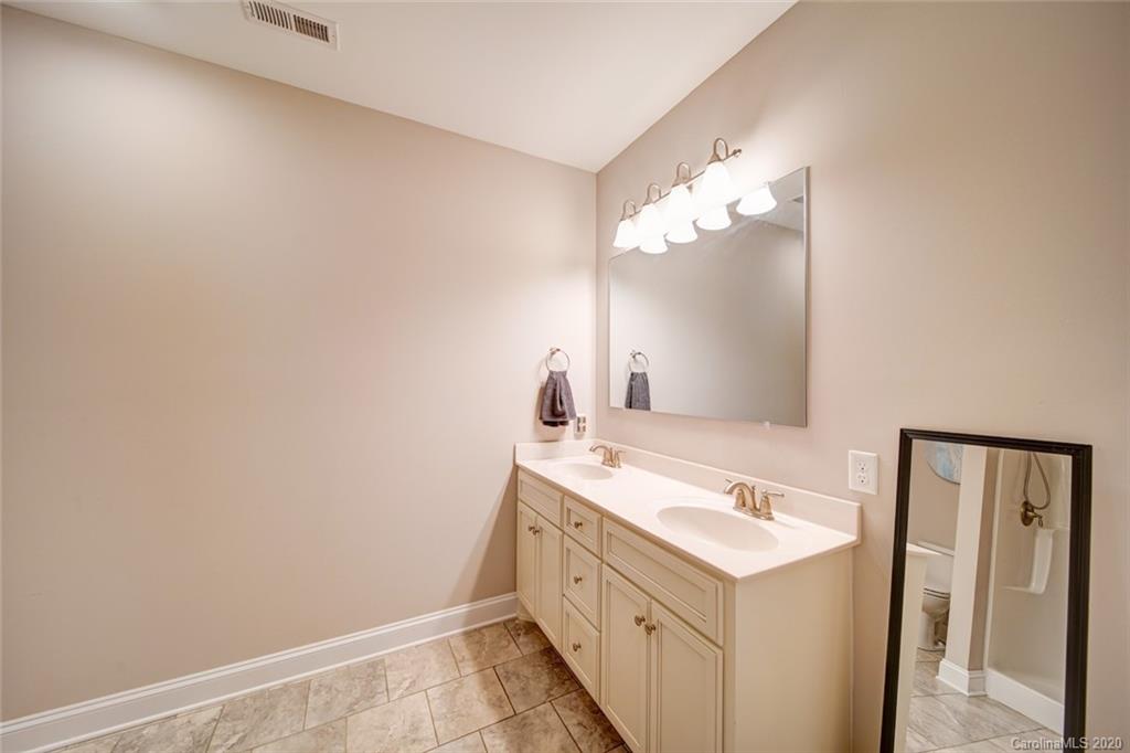 3018 Ranger Road Clover, SC 29710 - Photo 21 of 31 a bathroom with a sink vanity and a mirror